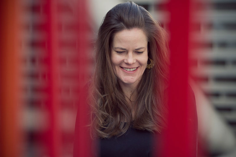 candid photograph of woman smiling